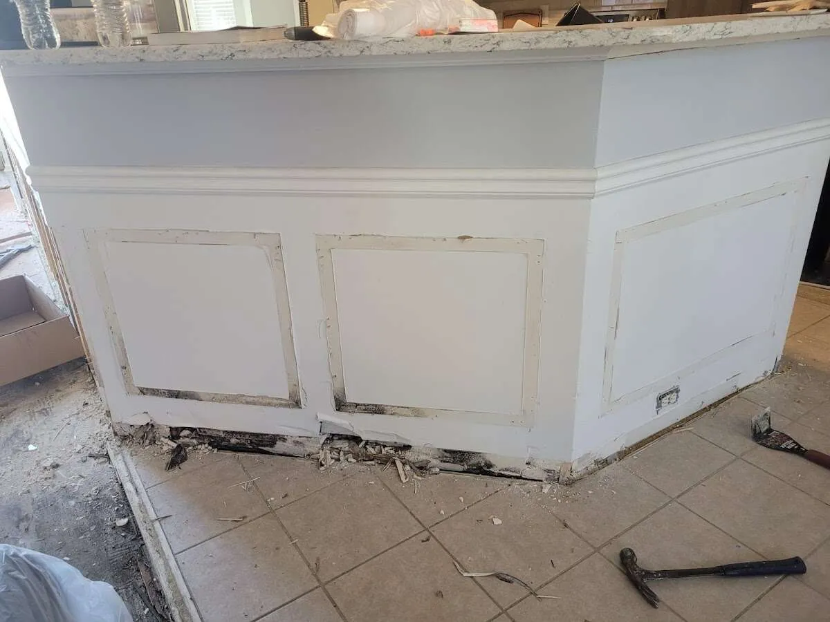 Water damage and mold on kitchen during Storm Damage Restoration in Laie